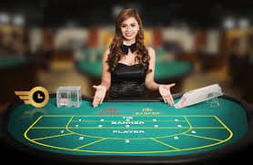 Studio Dream Gaming menampilkan dealer profesional di balik meja blackjack dengan streaming HD